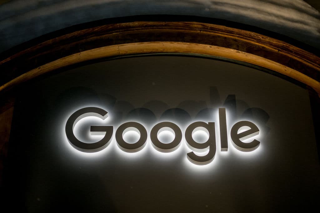 Is Alphabet Stock a Long-Term Buy as AI Investments Drive Growth Amid Regulatory Scrutiny